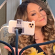 Image for article titled Spending An Uncomfortably Long Amount of Time Pondering Mariah Carey's Zoom Setup
